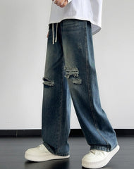 Blue Washed Ripped Style Jeans