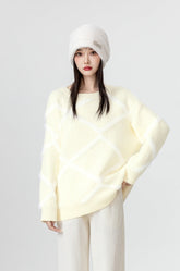 Cozy Beige Knit Sweater With Argyle Design