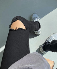 Trendy Black Kneeripped Slim Jeans