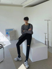 Trendy Black Kneeripped Slim Jeans