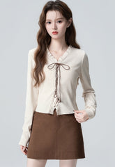 V Neck Knit Sweater With Ruffle Tie Design