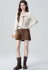 V Neck Knit Sweater With Ruffle Tie Design