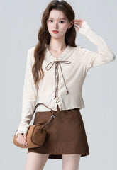 V Neck Knit Sweater With Ruffle Tie Design