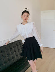 Black Pleated Skirt With Bow Detail