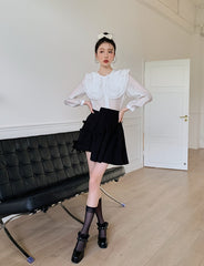 Black Pleated Skirt With Bow Detail