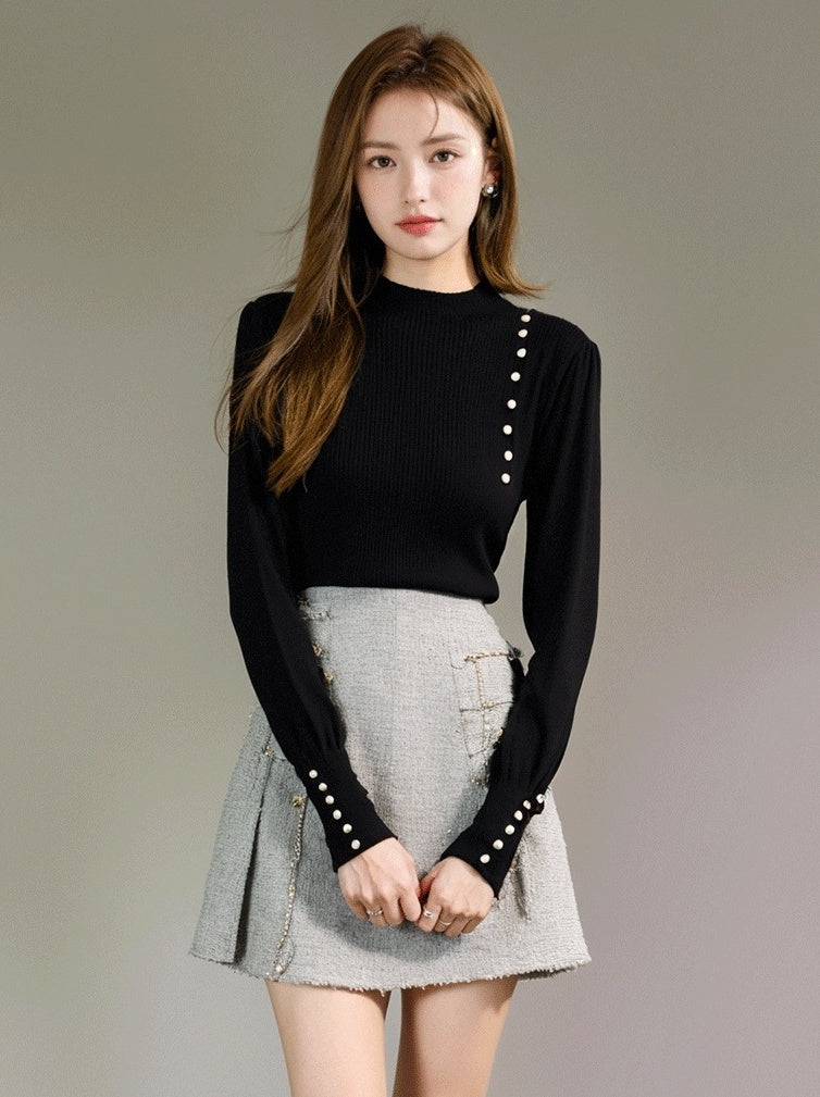 Black Knit Sweater With High Neck and Button Design
