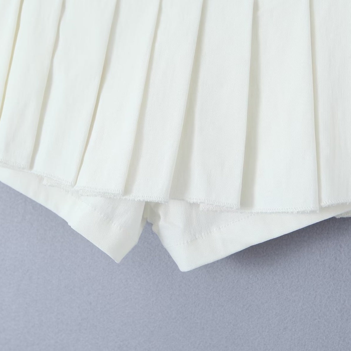 Black Triple Buttoned Pleated Mini Skirt