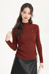 Red Turtleneck Sweater With Side Drawstring And Bow Logo