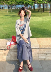 Plaid Skirt And Printed Tee Casual Outfit Set