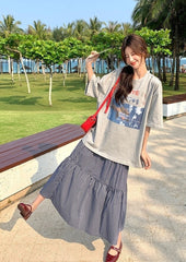 Plaid Skirt And Printed Tee Casual Outfit Set