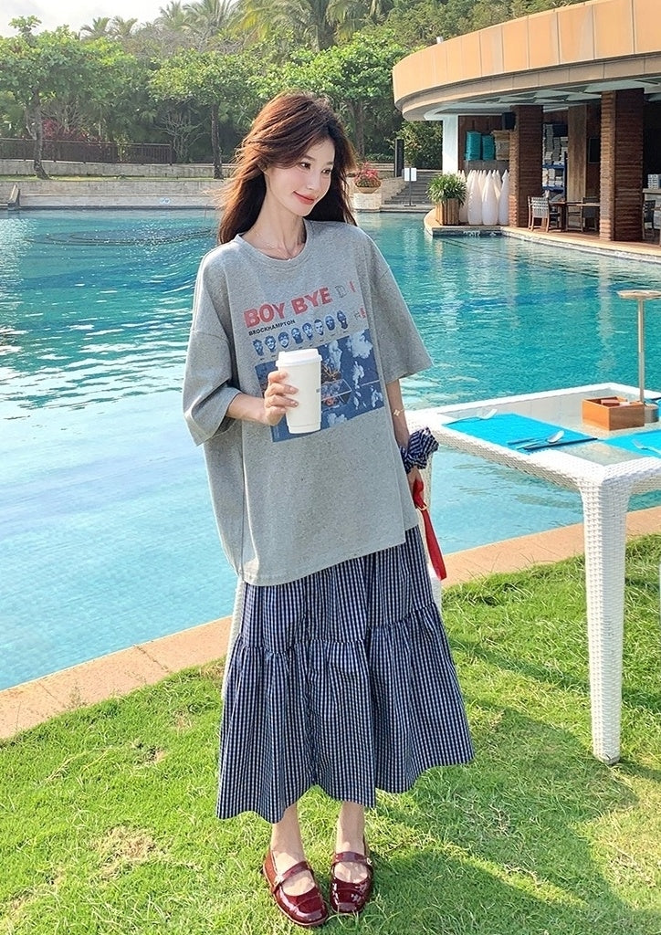 Plaid Skirt And Printed Tee Casual Outfit Set