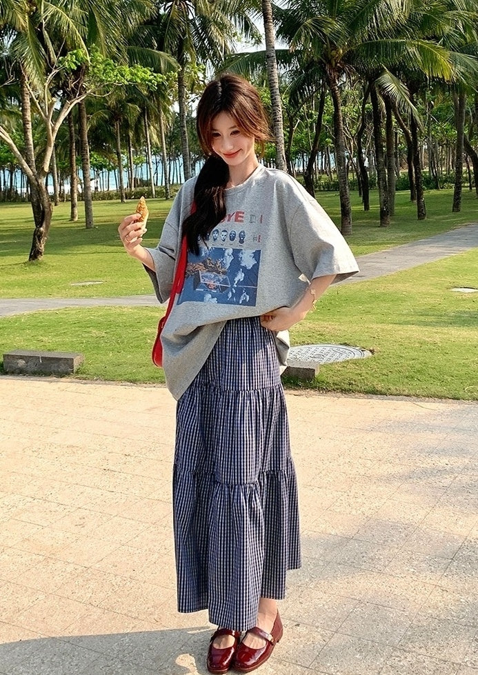 Plaid Skirt And Printed Tee Casual Outfit Set