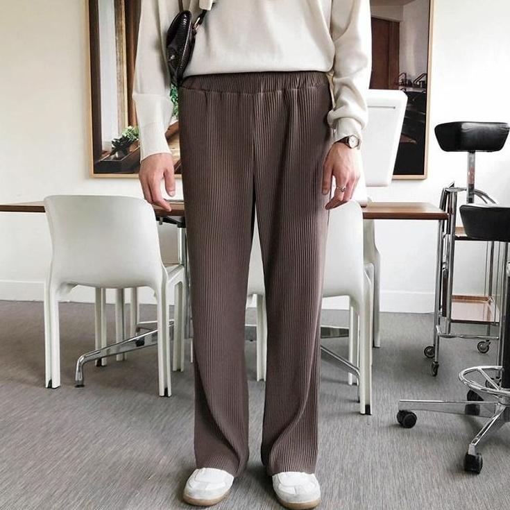 Trendy Relaxed Fit Pleated Trousers