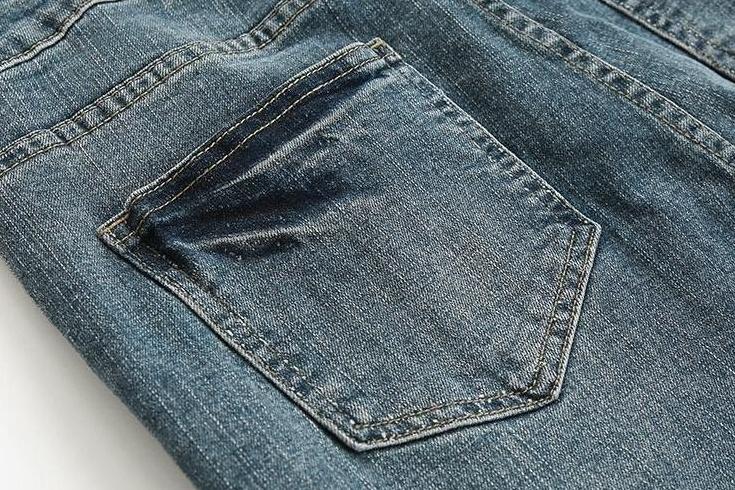 Trendy Tapered Denim Pants With Distressed Design
