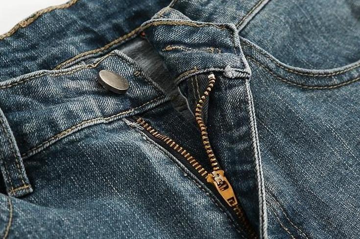 Trendy Tapered Denim Pants With Distressed Design