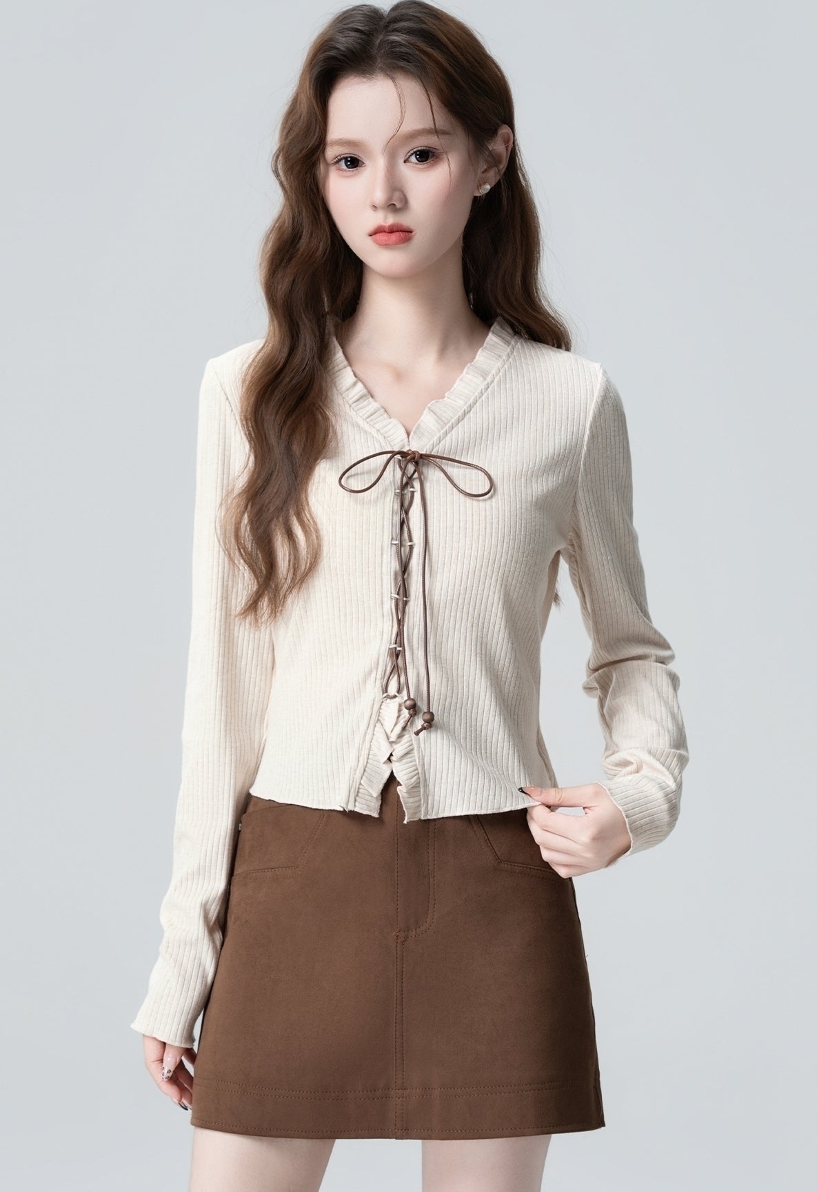 V Neck Knit Sweater With Ruffle Tie Design