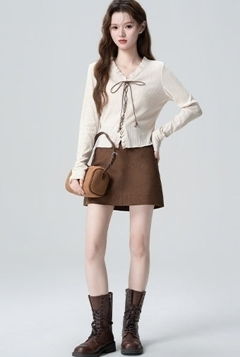 V Neck Knit Sweater With Ruffle Tie Design