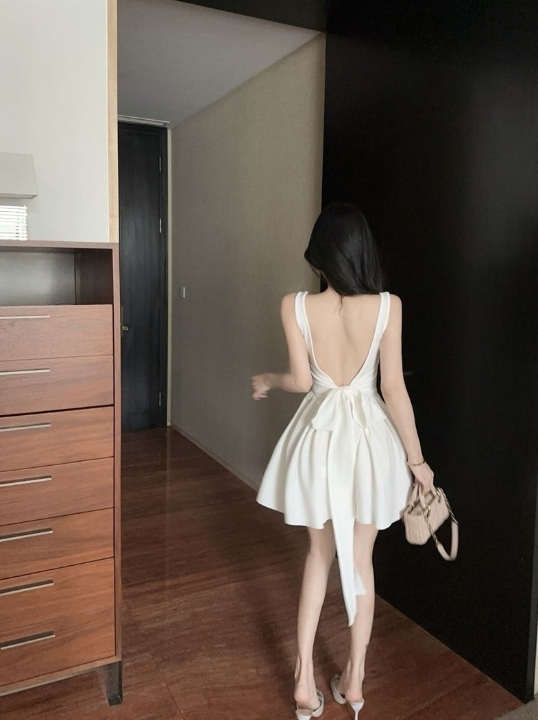 White Bow Peplum Dress