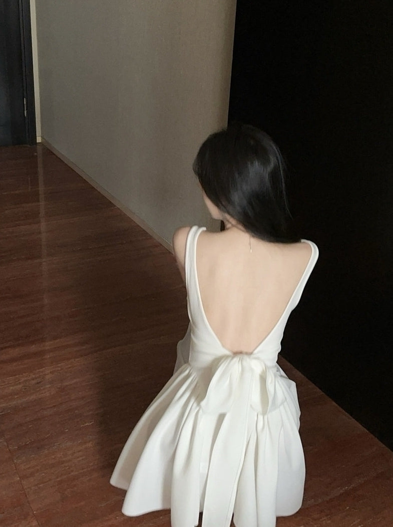 White Bow Peplum Dress
