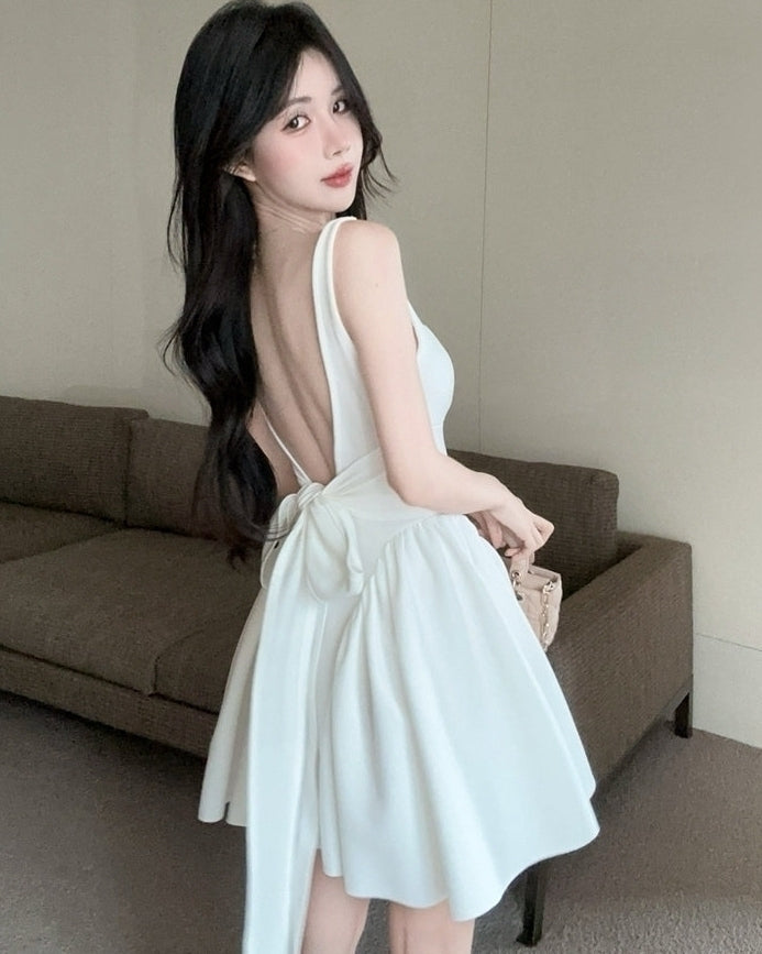 White Bow Peplum Dress