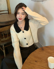 White Knitted Cardigan With Black Collar