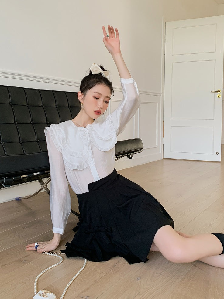 Black Pleated Skirt With Bow Detail