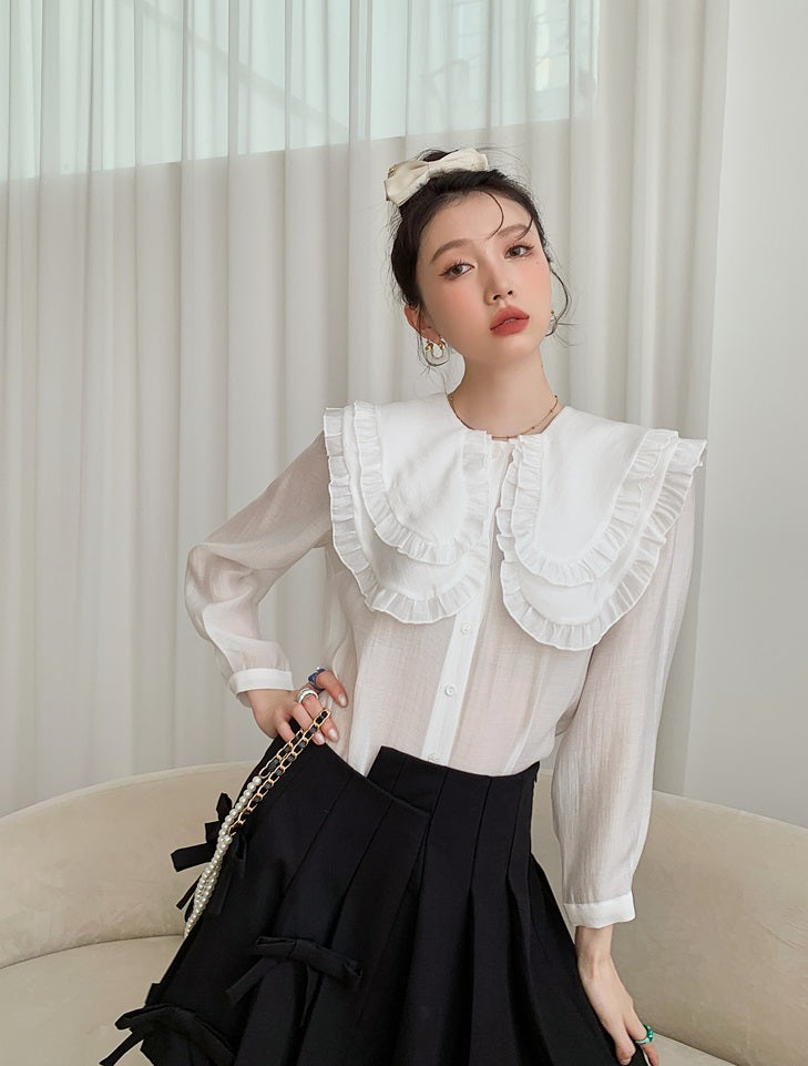 Black Pleated Skirt With Bow Detail