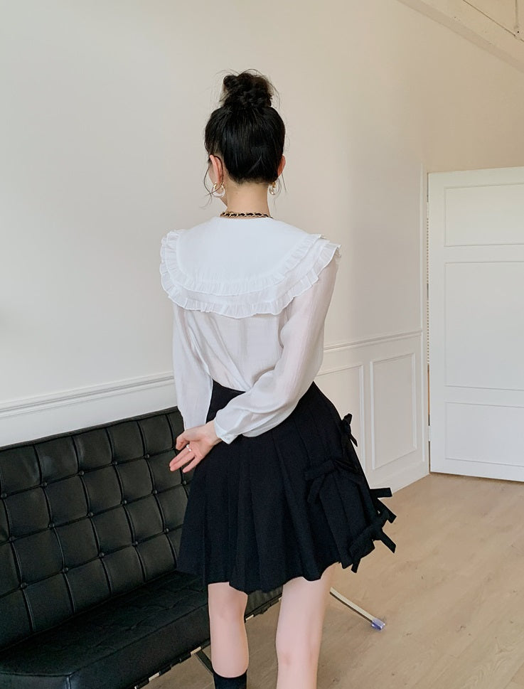 Black Pleated Skirt With Bow Detail