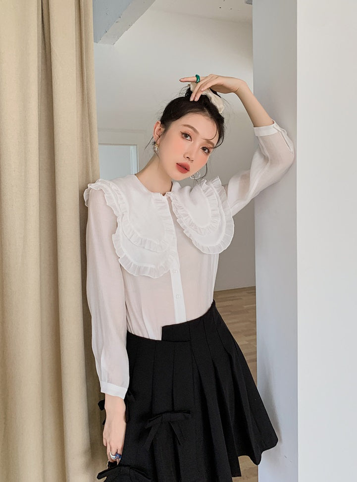 Black Pleated Skirt With Bow Detail