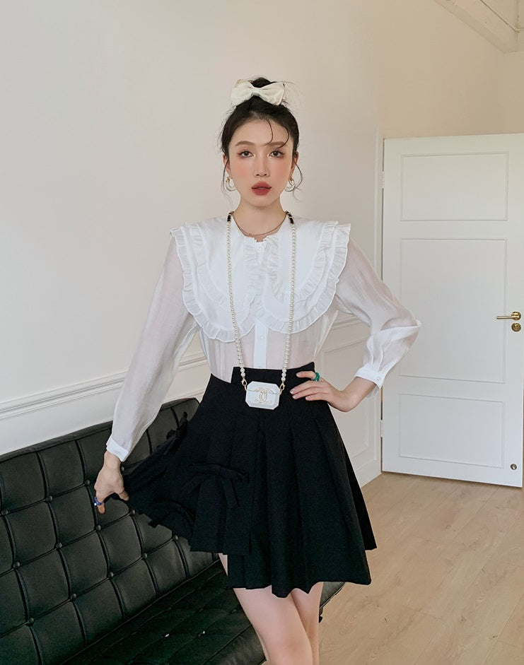 Black Pleated Skirt With Bow Detail